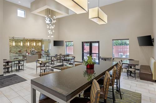 a dining room with a table and chairs at Best Western Plus Zion Canyon Inn & Suites in Springdale