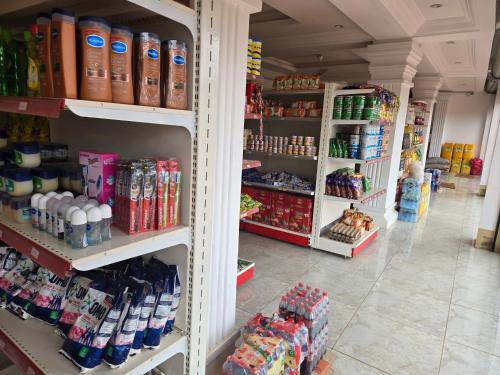 a store filled with lots of products on shelves at Hillview Guest House 
