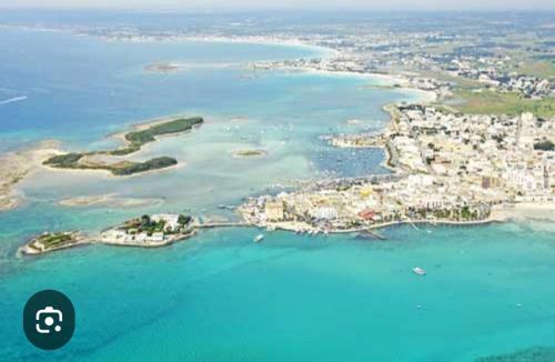 an aerial view of a group of islands in the water at Case vacanze LULU in Seclì