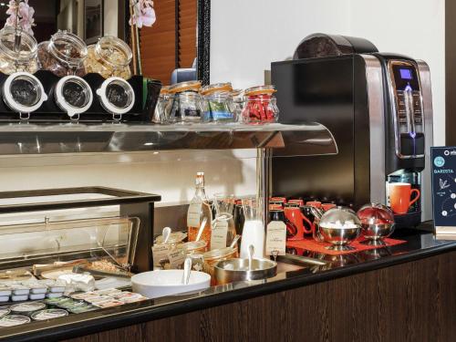 Una cocina o zona de cocina en Aparthotel Adagio La Défense Esplanade
