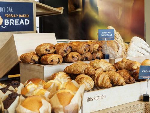a bakery with lots of different types of bread at Ibis Sheffield City in Sheffield