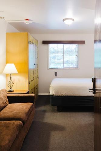 Ένα ή περισσότερα κρεβάτια σε δωμάτιο στο Crystal Mountain Hotels