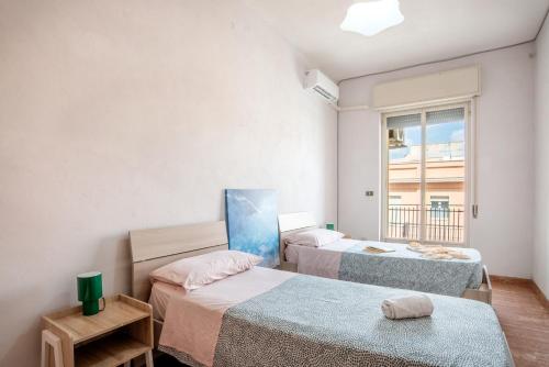 Postel nebo postele na pokoji v ubytování Casa Corso Mare Villa