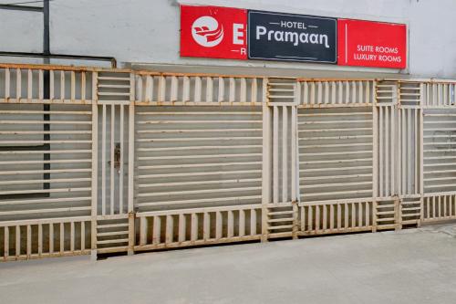 a row of wooden garage doors in a store at Hotel O The Pramaan in Kukatpalli