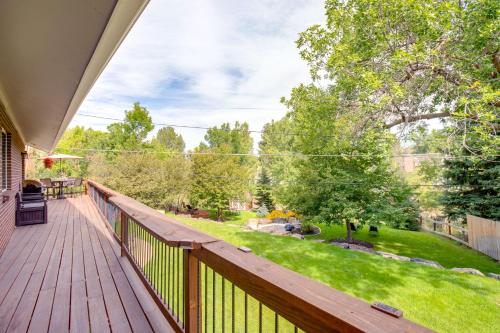 a deck with a view of a yard at Modern Creekside Home 9 Mi to Downtown Denver in Lakewood