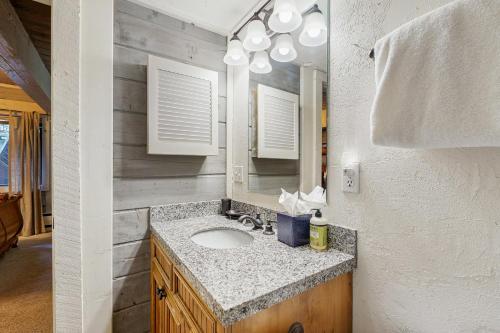 a bathroom with a sink and a mirror at Interlochen #B9 in Vail