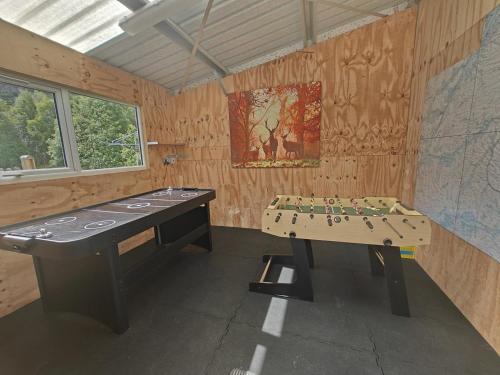 a room with a table and a map on the wall at 1 Bed in Newtonmore oc-b32417 in Newtonmore