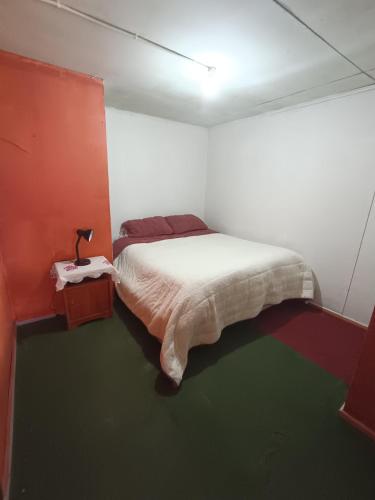 Postel nebo postele na pokoji v ubytování Mate Sur Hostal