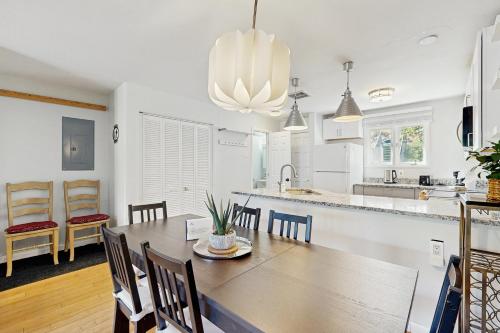 a kitchen and dining room with a table and chairs at Vail View Dreams in Vail