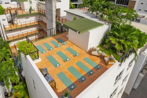 an aerial view of a building with a swimming pool at Balfour Miami Beach, a Morgans Originals hotel in Miami Beach