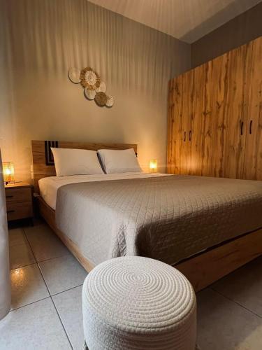 Ένα ή περισσότερα κρεβάτια σε δωμάτιο στο Aitheros