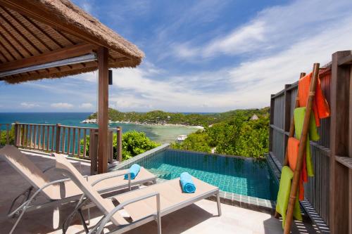 a view of the ocean from the balcony of a villa at The Fisherman's Villas in Koh Tao