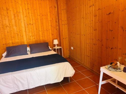 Katil atau katil-katil dalam bilik di Mountain Chalet Sea Views & Pool