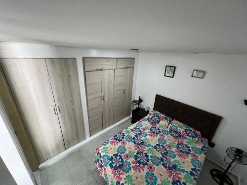 Ένα ή περισσότερα κρεβάτια σε δωμάτιο στο Apartamento Vital