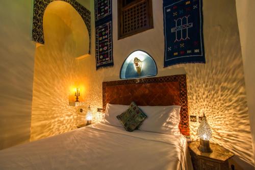 Riad Dar Mansoura 객실 침대
