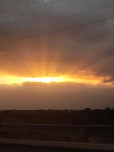 a sunset on the side of a road at Los Eucaliptos in Fasnia
