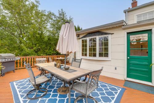 a patio with a table and an umbrella at Somerset Home with Large Yard Near Parks and Trails in Somerset