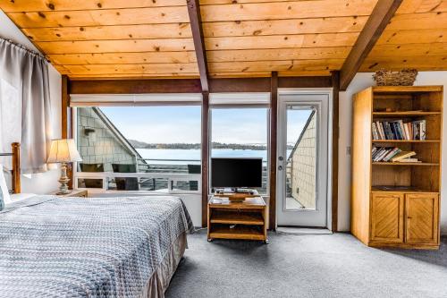 Ένα ή περισσότερα κρεβάτια σε δωμάτιο στο Embarcadero Condo #E225