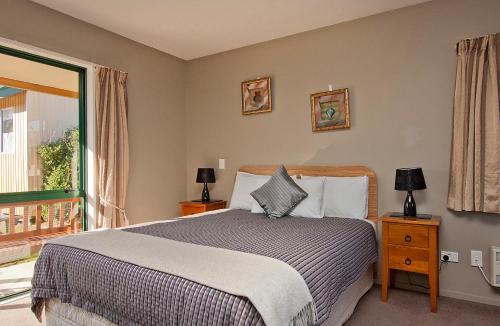 Postel nebo postele na pokoji v ubytování Coronation Park Motels