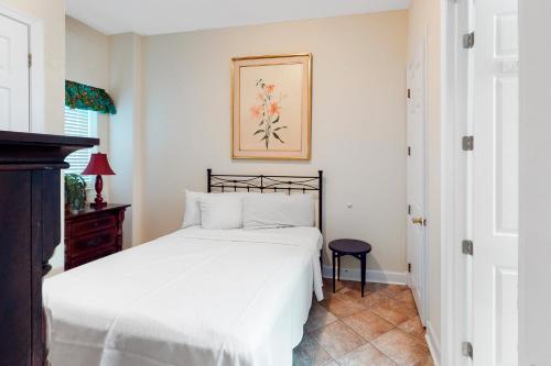 Ένα ή περισσότερα κρεβάτια σε δωμάτιο στο Regency Isle P1109
