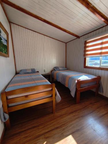 Postel nebo postele na pokoji v ubytování Hostel