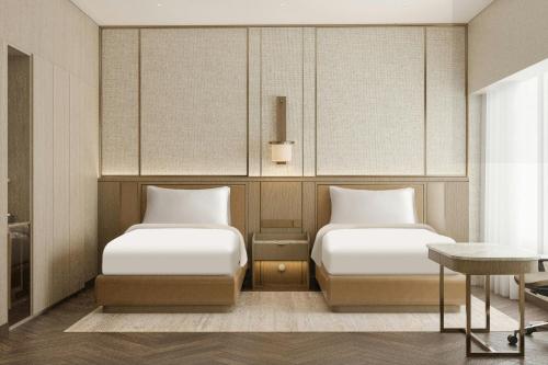 Katil atau katil-katil dalam bilik di JW Marriott Hotel Jakarta