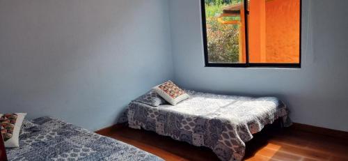Postel nebo postele na pokoji v ubytování Posada El Remolino