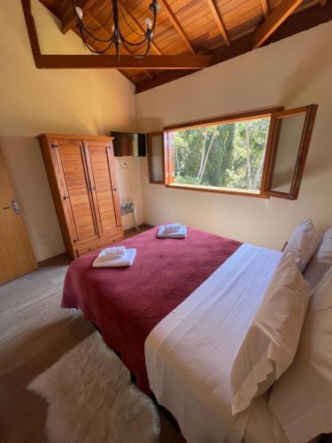 Ένα ή περισσότερα κρεβάτια σε δωμάτιο στο Villa Piccola Italia