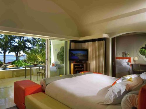 Postel nebo postele na pokoji v ubytování SO/ Sofitel Mauritius