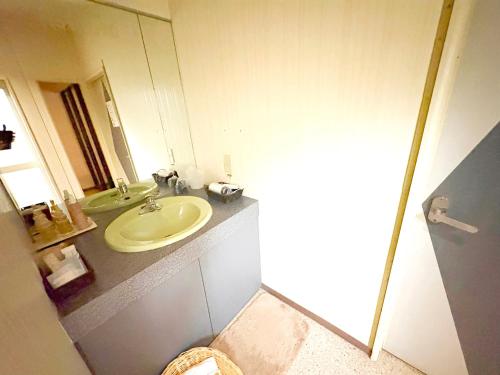 Un baño de ティアラ