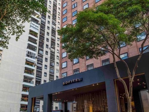 a store in front of a tall building at Sofitel Buenos Aires Recoleta in Buenos Aires