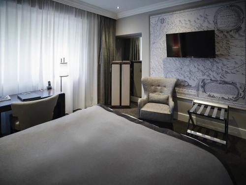 Katil atau katil-katil dalam bilik di Park Hotel Grenoble - MGallery Collection