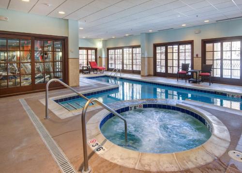 a large indoor pool with a hot tub at Avon Ascent Retreat Indoor Pool Ski Shuttle in Avon