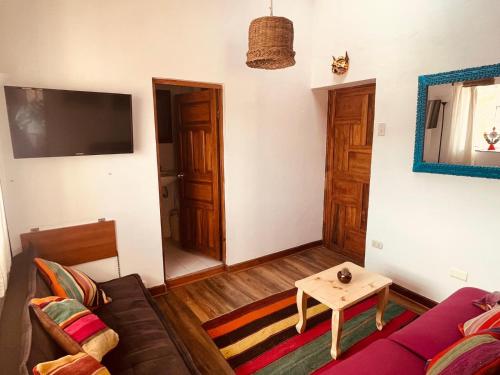 Télévision ou salle de divertissement dans l'établissement Saqray Hostel