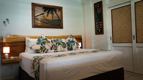 Una cama o camas en una habitación de Mokusiga Villas