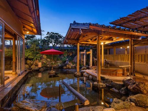 a large pool of water in a house at Haifu in Shima
