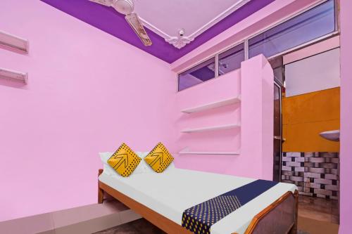 Ένα ή περισσότερα κρεβάτια σε δωμάτιο στο Hotel O City Era
