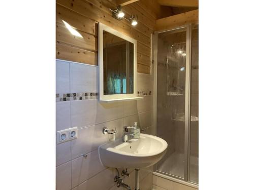 a bathroom with a sink and a shower at Holiday home in Rieden with swimming pool in Rieden