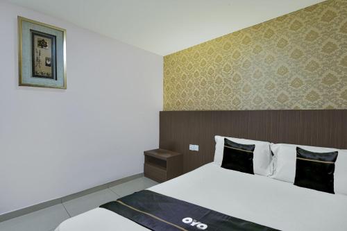 Katil atau katil-katil dalam bilik di Hotel O Hotel Hamilas