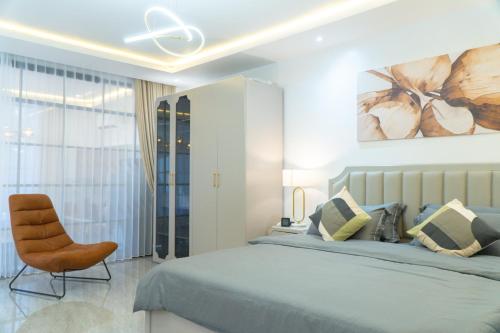 Ένα ή περισσότερα κρεβάτια σε δωμάτιο στο Tres Villas Kuta