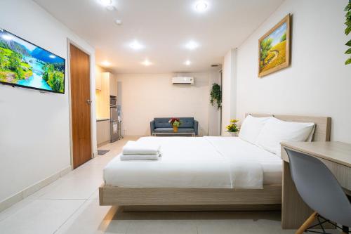 Ένα ή περισσότερα κρεβάτια σε δωμάτιο στο Jade house Hồ Con Rùa