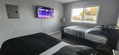 En eller flere senge i et værelse på Amazing 2bdr Huntington Beach Home