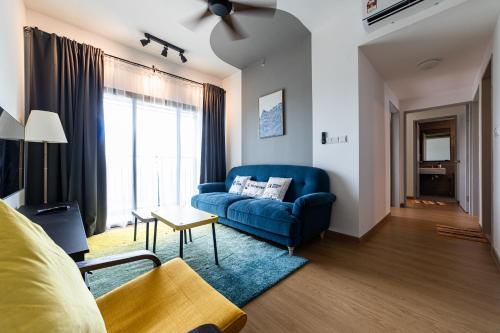 MayaBay Residence SplashMania Gamuda Cove Homestay by Sleepy Bearにあるシーティングエリア