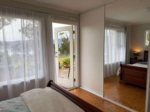Cama o camas de una habitación en The Seaside House - A little gem by the sea