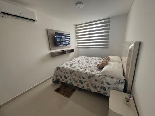 Katil atau katil-katil dalam bilik di Nice downtown apartment Irala Building 452