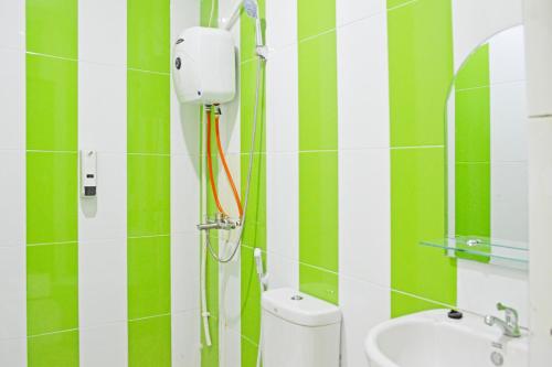 Ένα μπάνιο στο OYO 94773 City Inn