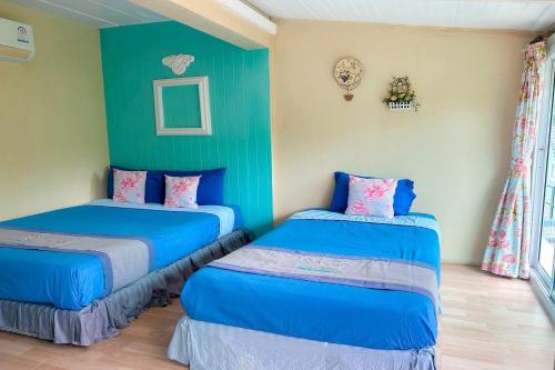 เตียงในห้องที่ See Sky Resort