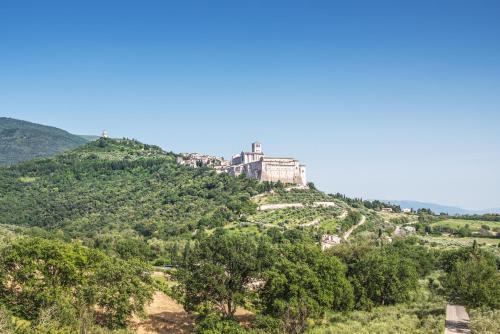 a castle on top of a hill at La Dimora di Francesco in Assisi