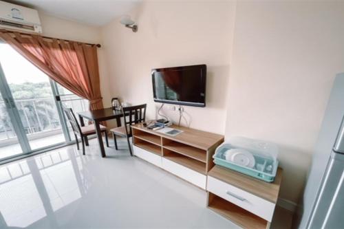 Μια τηλεόραση ή/και κέντρο ψυχαγωγίας στο The Grow Hotel & Residence