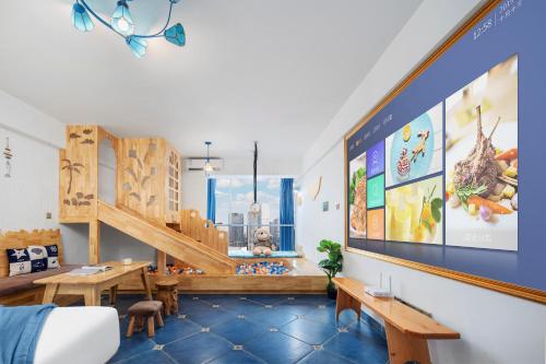 a room with a staircase and a desk and a table at Dori1993 Hotel in Changsha